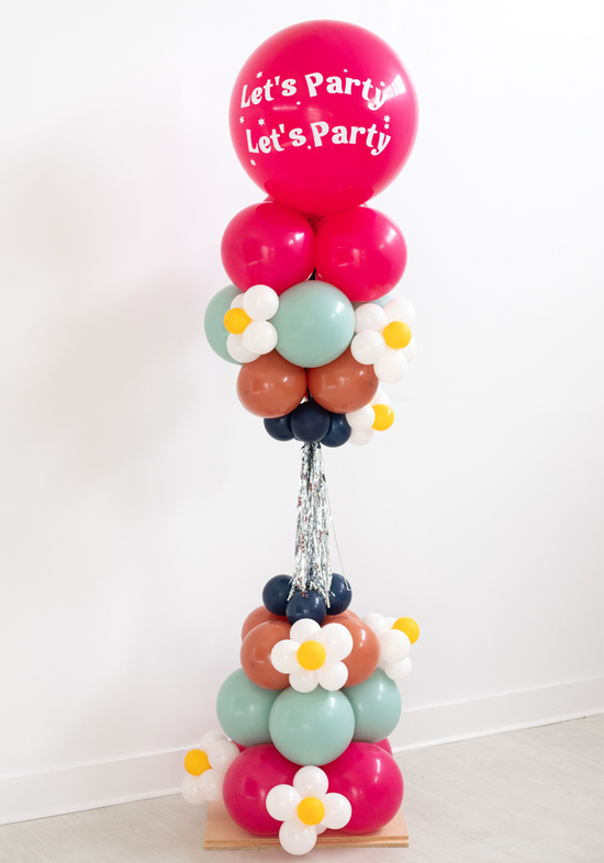 Glo Party Balloon Tower with tassels and floral additions